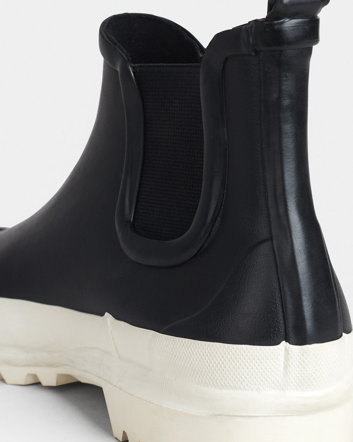 Chelsea Rainboots in color black with white sole by Ilse Jacobsen