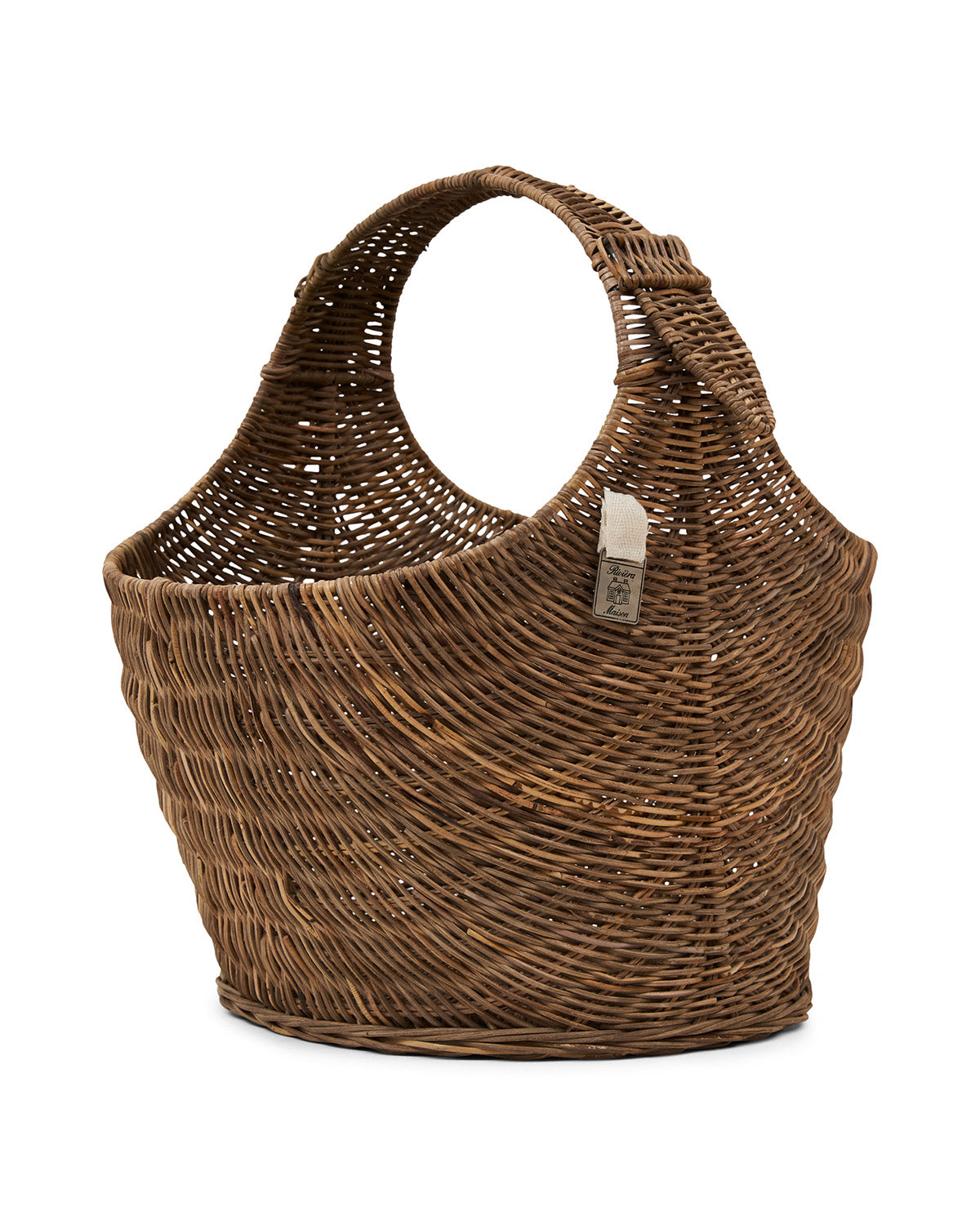 MAGAZINE BASKET made of rattan in the shape of a bag by Riviera Maison