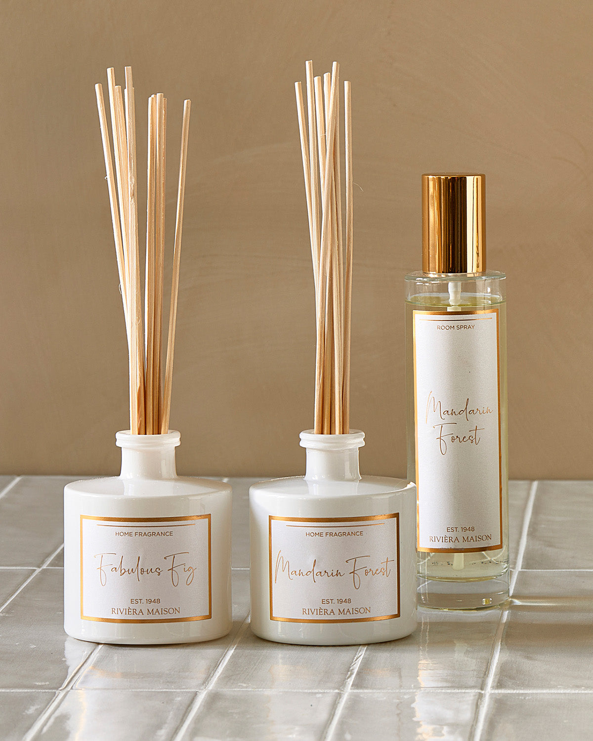 Two FABULOUS FIG FRAGRANCE STICKS in white glasses by Riviera Maison