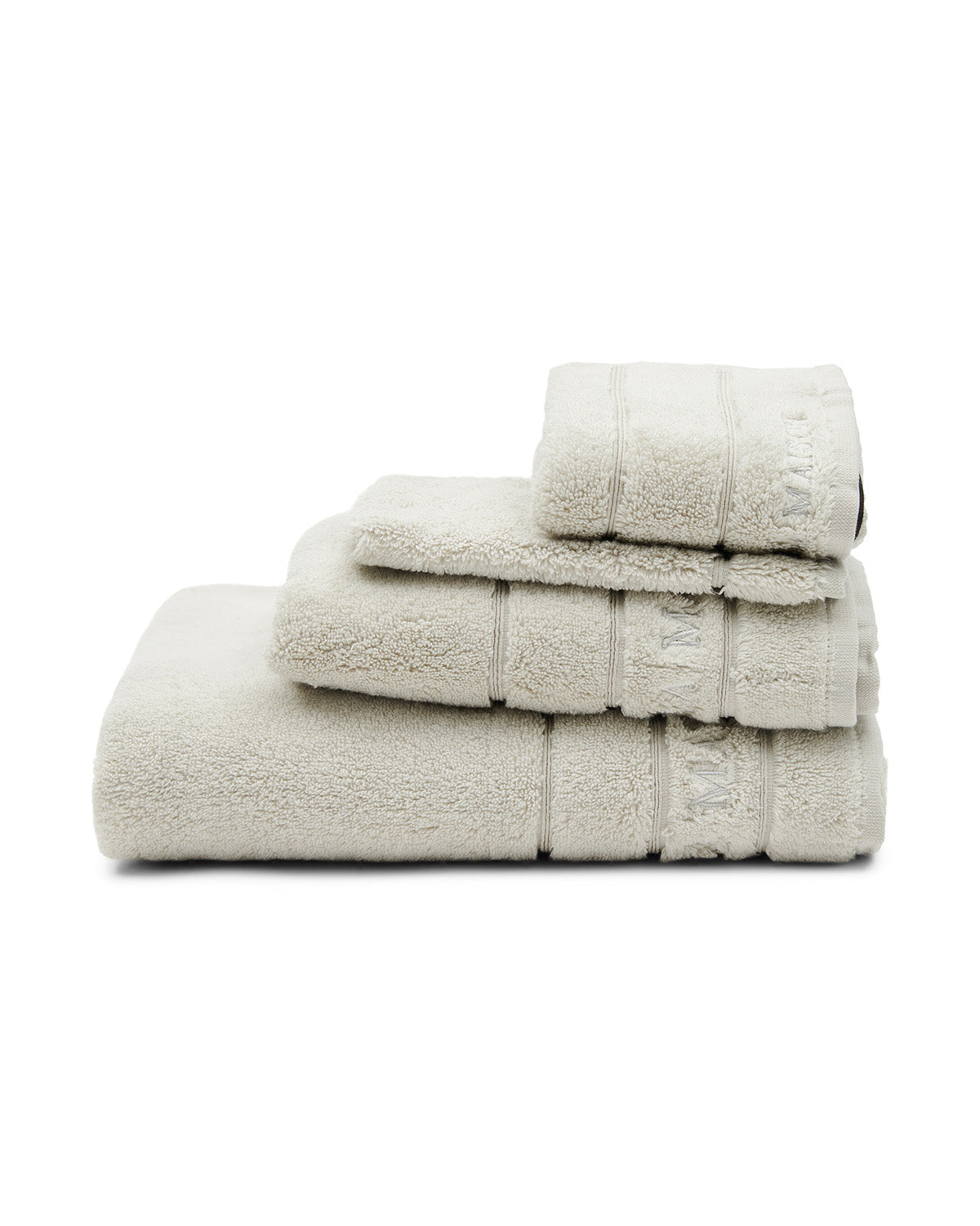 TOWELS  soft, thick, stone-colored  on a chair by Riviera Maison