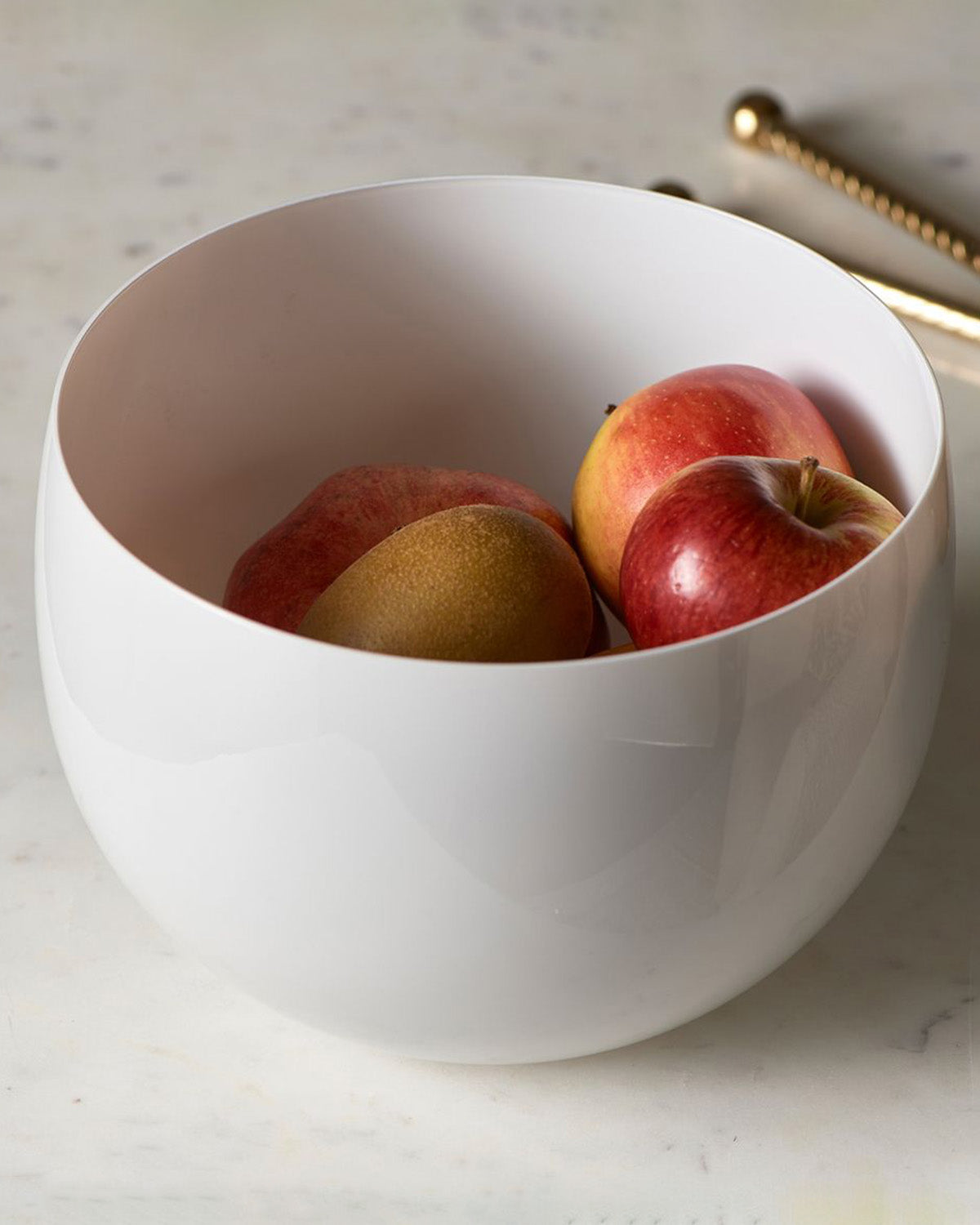Softly rounded glass bowl in color white, decorated with fruits by Riviera Maison