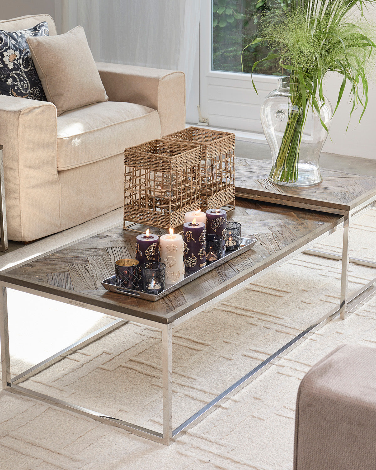 HURRICANE lamp made of woven rustic Rattan, decorated on a table by Riviera Maison