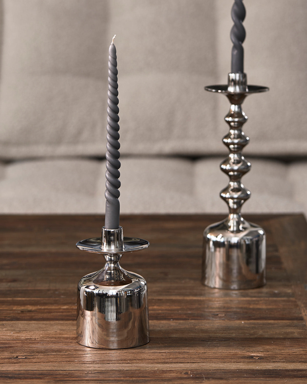 CANDLE HOLDER with grey candles made of shiny aluminum by Riviera Maison