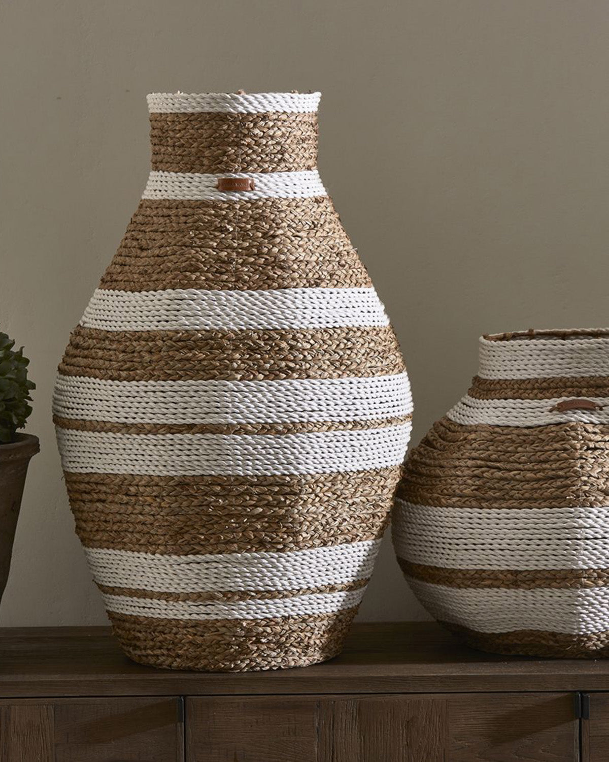 Vase, made of raffia stripped in brown and white by Riviera Maison 