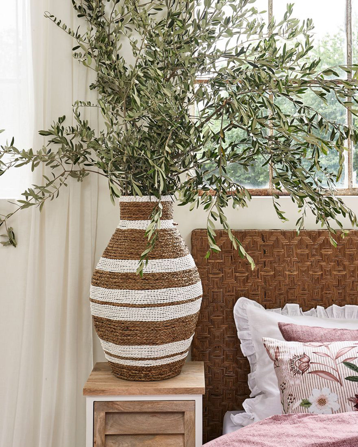 VASE made of raffia hand-woven, partially painted white, decorated wit green plants by Riviera Maison