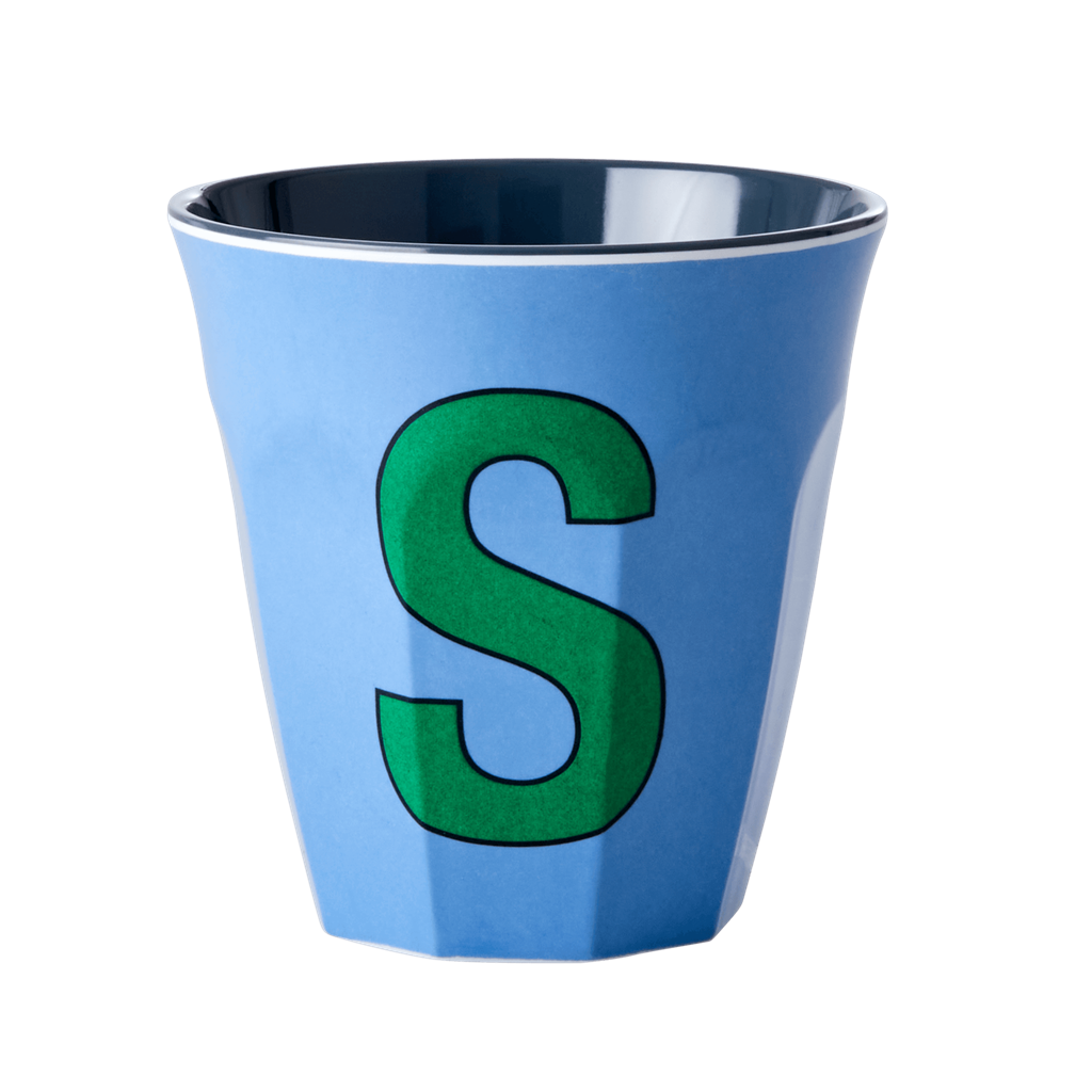 Melamine cup by Rice by Rice in the colors light blue, green, and bluet with the letter "S"